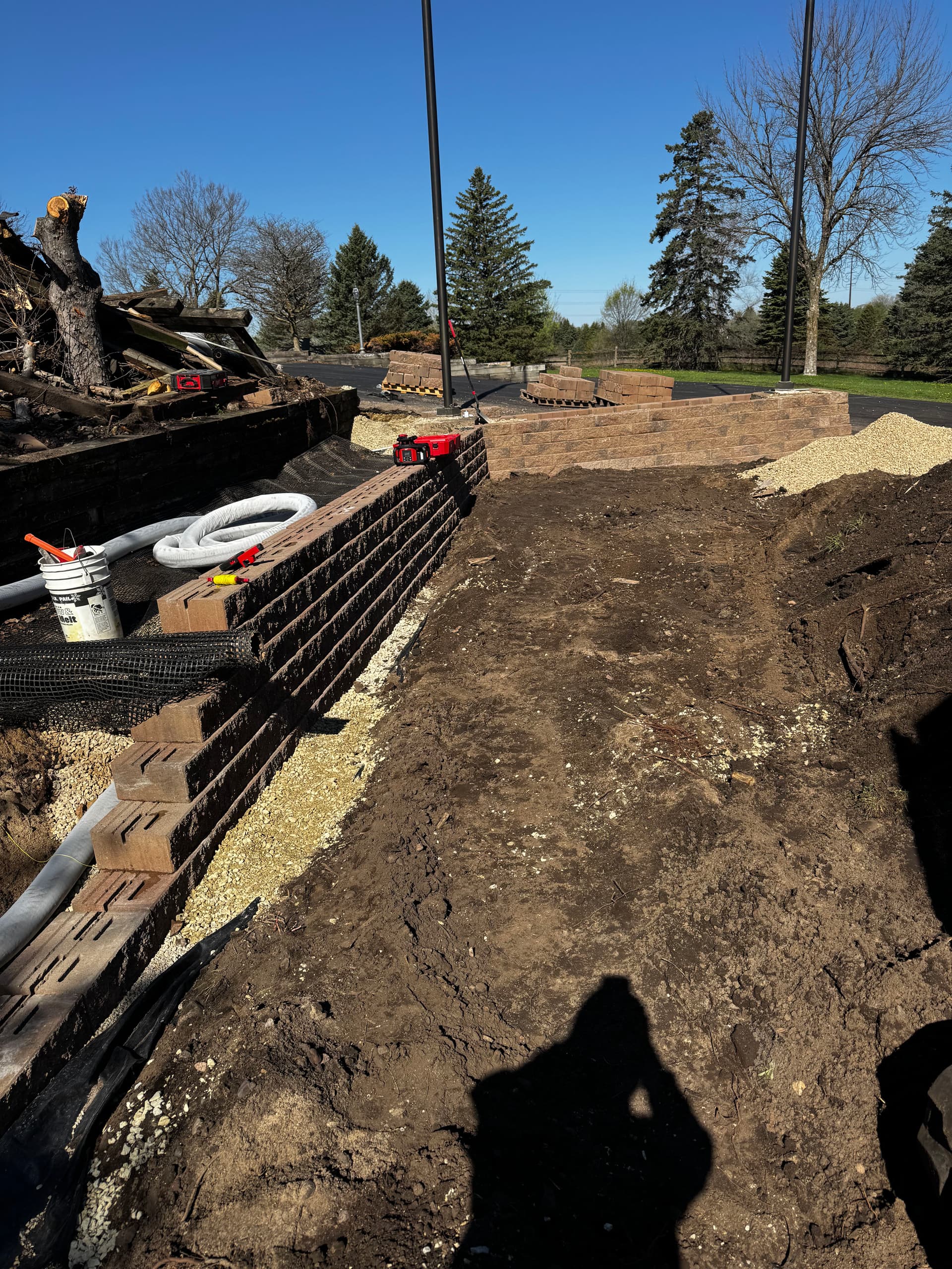 Old Timber Out, Versa-Lok In - Farmington MN Retaining Wall Rebuild image